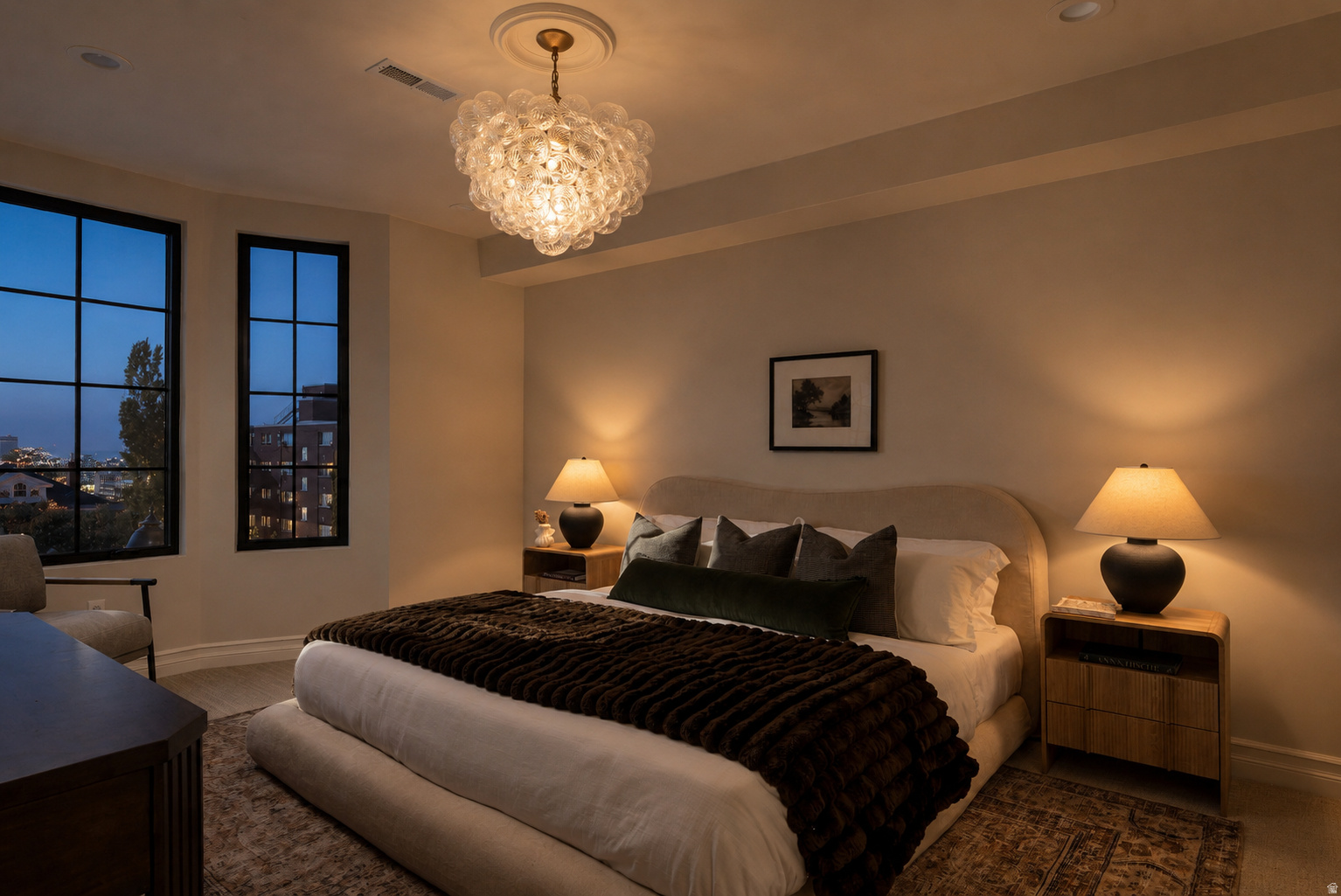 Two large casement windows with black trim, recessed lighting, and a decorative ceiling light fixture