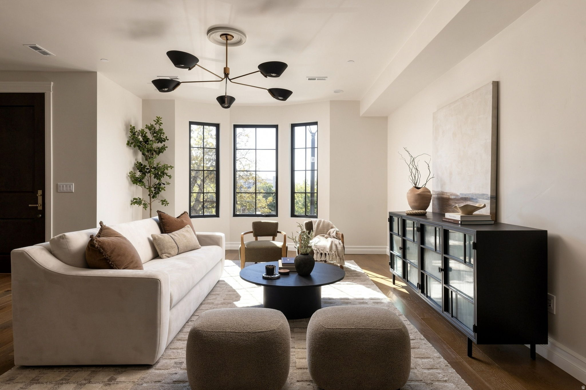 Hardwood flooring complementing light wall tones